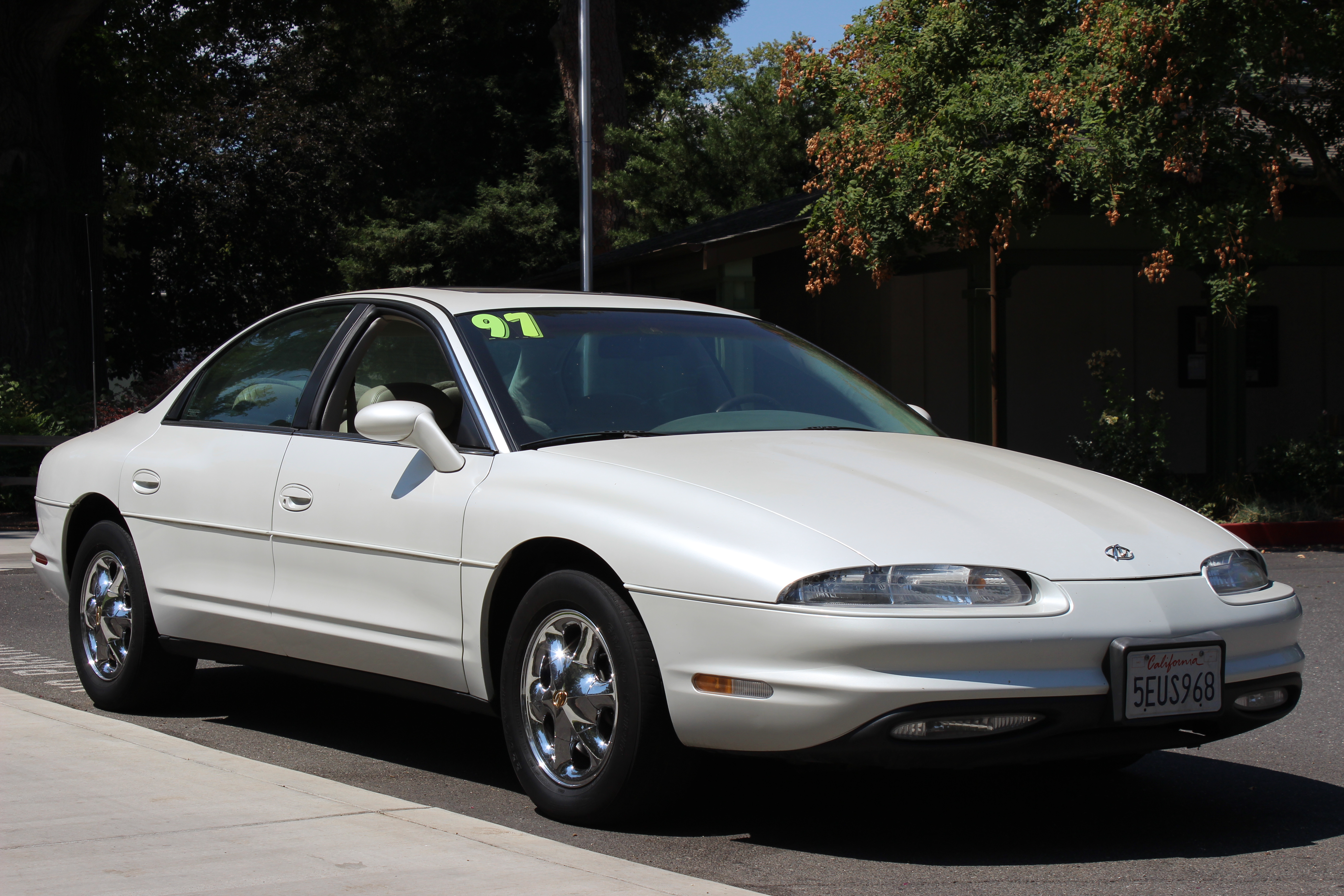 1997 OLDSMOBILE AURORA V8 ..THE POWER BEHIND INDY...HANDOUT STYLE BROCHURE 