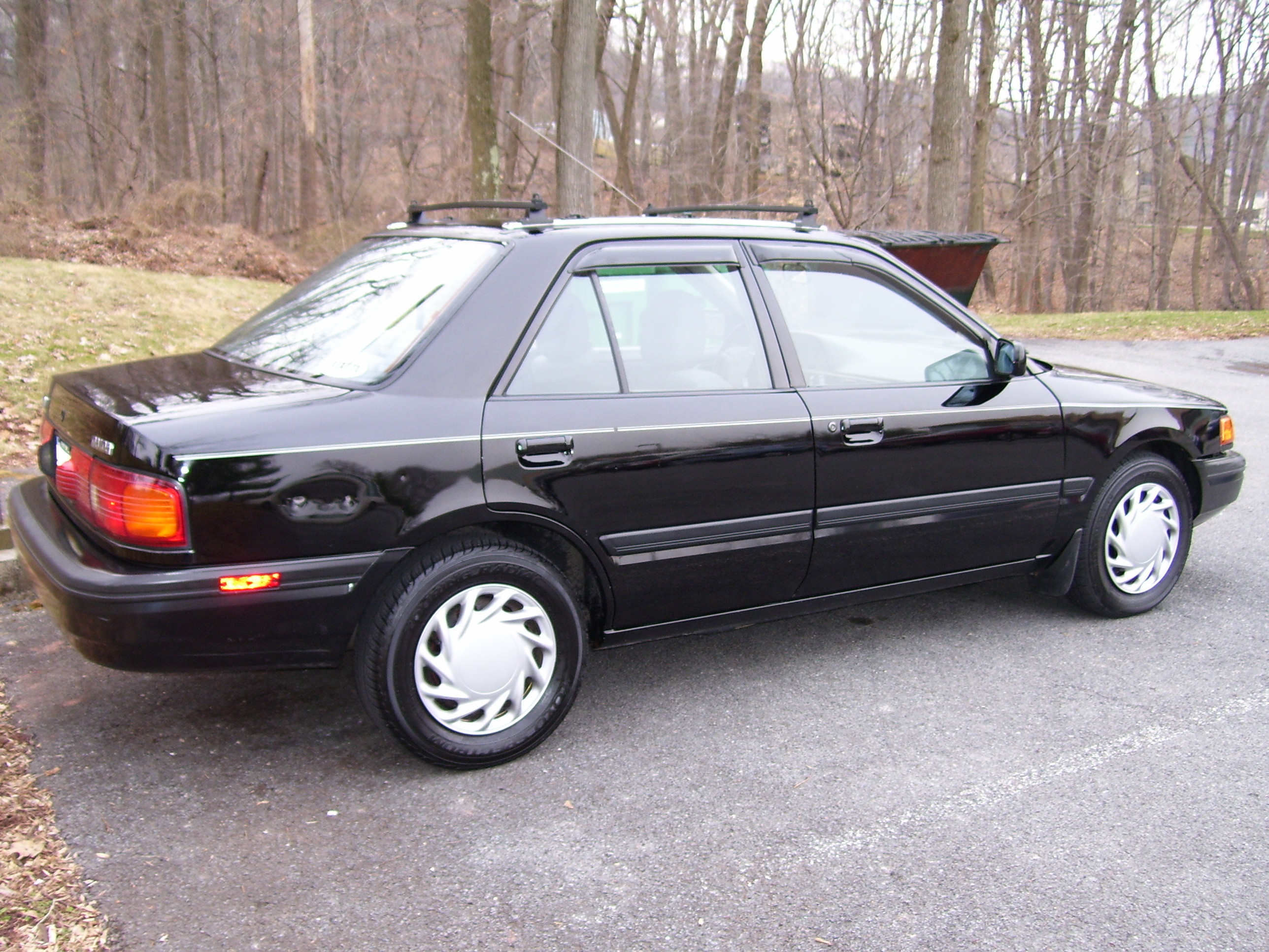 Mazda 1992. Мазда протеже 1992. Mazda protege 7. Mazda 126. Mazda 1990-2000.